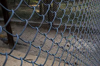 A close up of the chain link fence